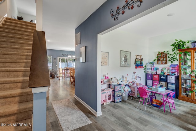 107 Sandpiper Ln, Little Egg Harbor, NJ 08087 - rec room with wood finished floors, a chandelier, and recessed lighting