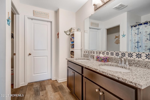 107 Sandpiper Ln, Little Egg Harbor, NJ 08087 - full bath featuring double vanity and wood finished floors