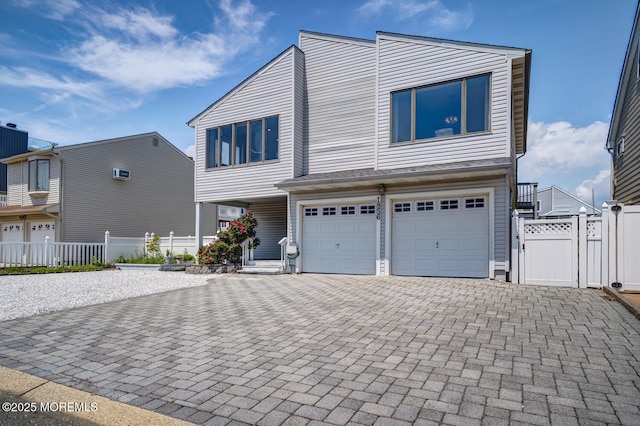 1856 Mill Creek Rd, Beach Haven West, NJ 08050 - view of property featuring an attached garage, decorative driveway, and a gate