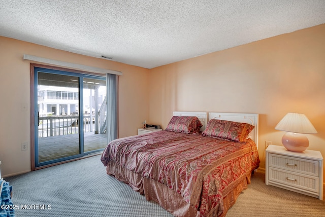 1856 Mill Creek Rd, Beach Haven West, NJ 08050 - carpeted bedroom with access to outside and a textured ceiling