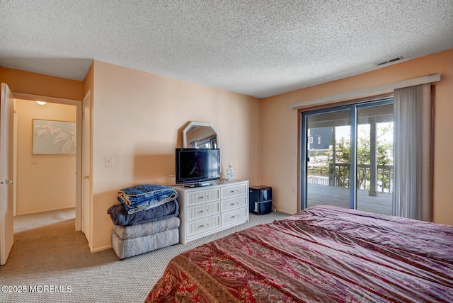 1856 Mill Creek Rd, Beach Haven West, NJ 08050 - bedroom featuring carpet flooring, access to exterior, and a textured ceiling