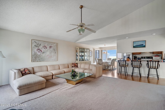 1856 Mill Creek Rd, Beach Haven West, NJ 08050 - living room with carpet, vaulted ceiling, ceiling fan, a textured ceiling, and wood finished floors