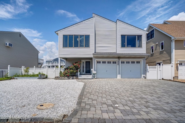 1856 Mill Creek Rd, Beach Haven West, NJ 08050 - view of front of home featuring decorative driveway, a garage, and a gate
