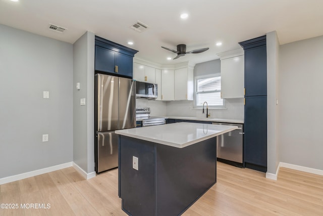 8 Phillips Rd, Brick, NJ 08724 - kitchen with stainless steel appliances, ceiling fan, light wood finished floors, light countertops, and recessed lighting