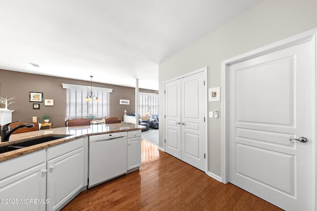 45 Marigold Ln, Little Egg Harbor, NJ 08087 - kitchen featuring dishwasher, hardwood / wood-style floors, white cabinetry, decorative light fixtures, and light stone counters