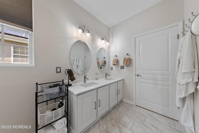 45 Marigold Ln, Little Egg Harbor, NJ 08087 - bathroom with double vanity and marble finish floors