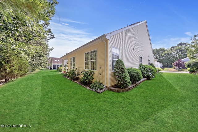 45 Marigold Ln, Little Egg Harbor, NJ 08087 - view of home's exterior featuring a lawn