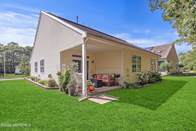 45 Marigold Ln, Little Egg Harbor, NJ 08087 - rear view of property with outdoor lounge area, a lawn, and a patio area