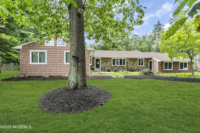 14 Copperfield Ct, Eatontown, NJ 07724 - ranch-style house featuring a front yard and stone siding