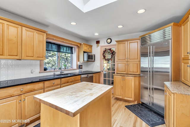 14 Copperfield Ct, Eatontown, NJ 07724 - kitchen with butcher block countertops, stainless steel appliances, light wood-type flooring, recessed lighting, and decorative backsplash