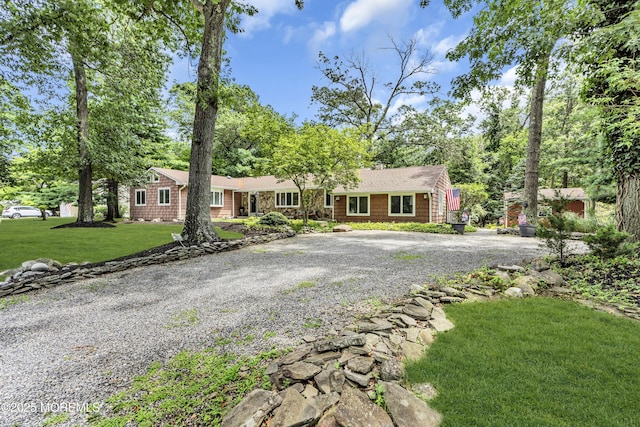 14 Copperfield Ct, Eatontown, NJ 07724 - ranch-style home featuring driveway and a front lawn