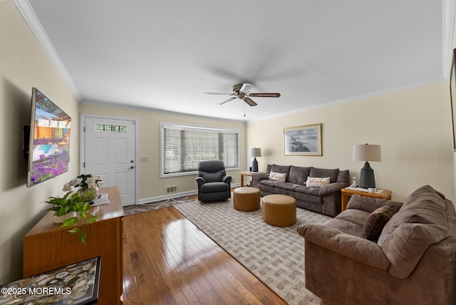 72 Broadway Rd, Freehold, NJ 07728 - living room featuring ornamental molding, a ceiling fan, and wood-type flooring