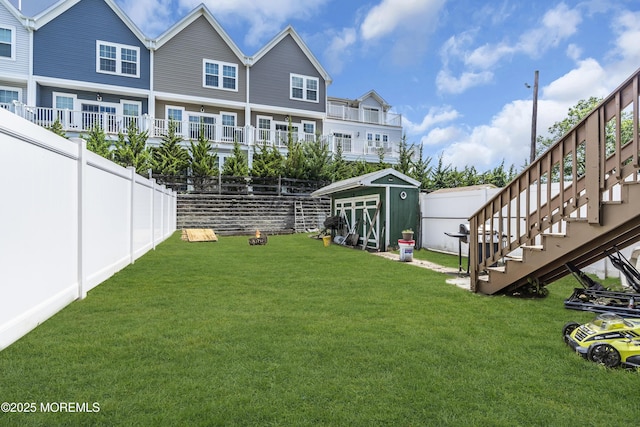 13 Locust St, Highlands, NJ 07732 - fenced backyard with a storage unit and stairway