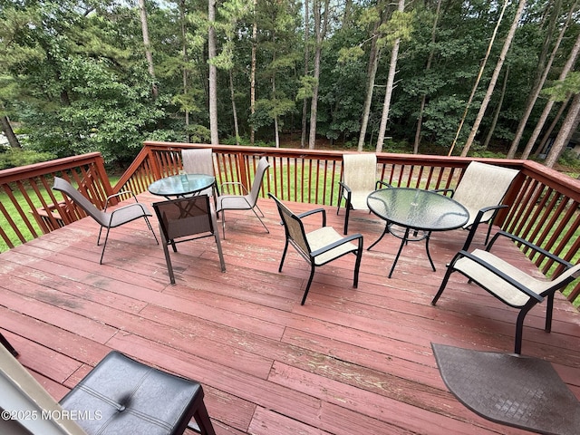 67 Erin Dr, Jackson, NJ 08527 - wooden terrace with outdoor dining space and view of scattered trees