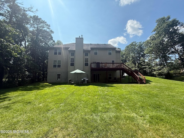 67 Erin Dr, Jackson, NJ 08527 - back of house with stairs, a wooden deck, a chimney, and a yard