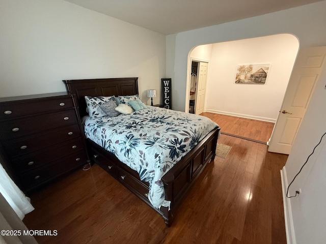 67 Erin Dr, Jackson, NJ 08527 - bedroom with dark wood-style floors and arched walkways