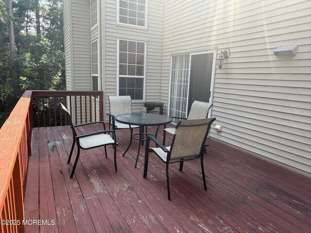 67 Erin Dr, Jackson, NJ 08527 - wooden deck featuring outdoor dining area
