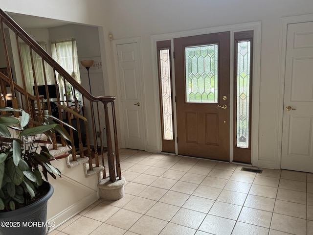 67 Erin Dr, Jackson, NJ 08527 - entryway with stairs and light tile patterned floors