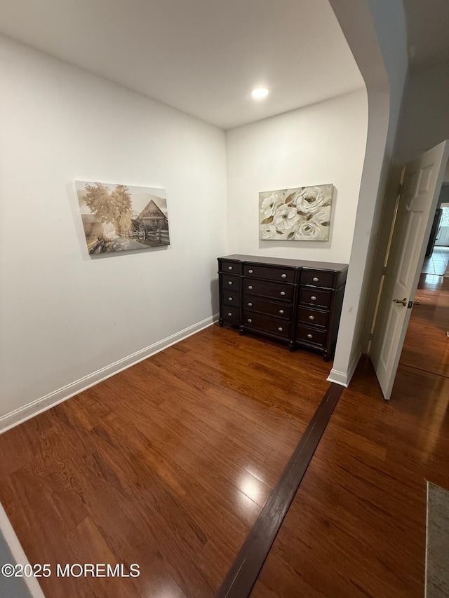 67 Erin Dr, Jackson, NJ 08527 - spare room featuring arched walkways, dark wood-type flooring, and recessed lighting
