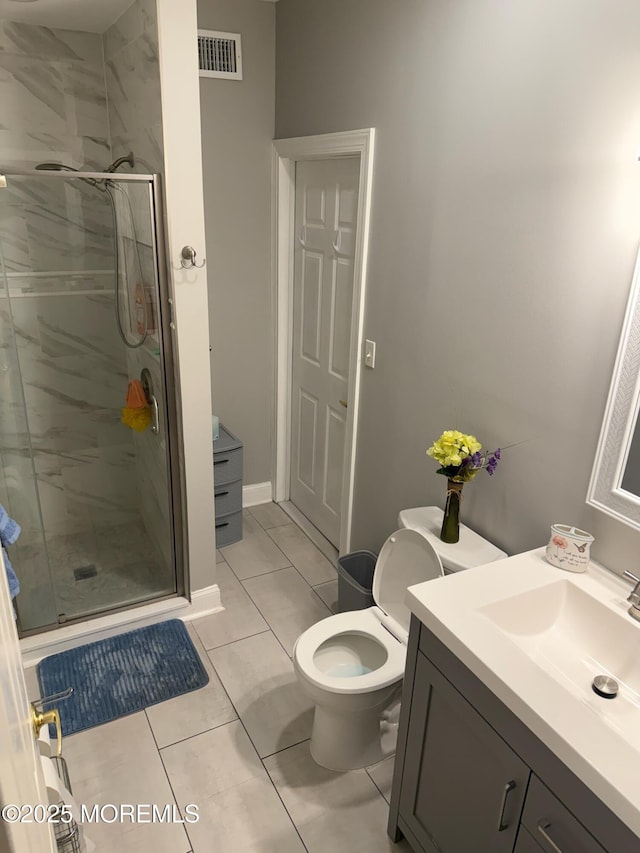 67 Erin Dr, Jackson, NJ 08527 - bathroom with vanity, a stall shower, and tile patterned flooring