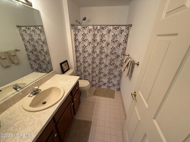 67 Erin Dr, Jackson, NJ 08527 - bathroom with vanity, tile patterned flooring, and a shower with curtain
