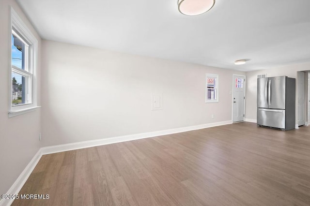 139 Seabreeze Ave, North Middletown, NJ 07748 - empty room featuring wood finished floors and plenty of natural light