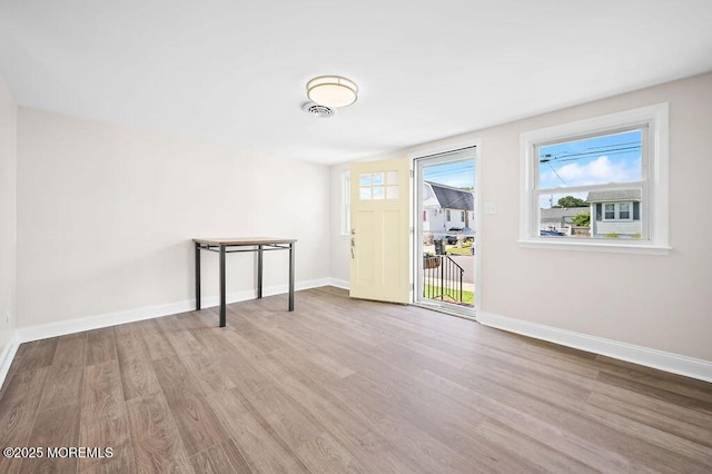 139 Seabreeze Ave, North Middletown, NJ 07748 - foyer entrance with wood finished floors and baseboards