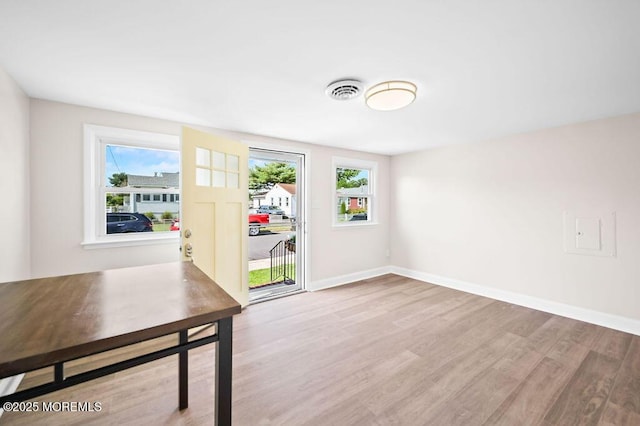 139 Seabreeze Ave, North Middletown, NJ 07748 - unfurnished dining area featuring healthy amount of natural light and wood finished floors
