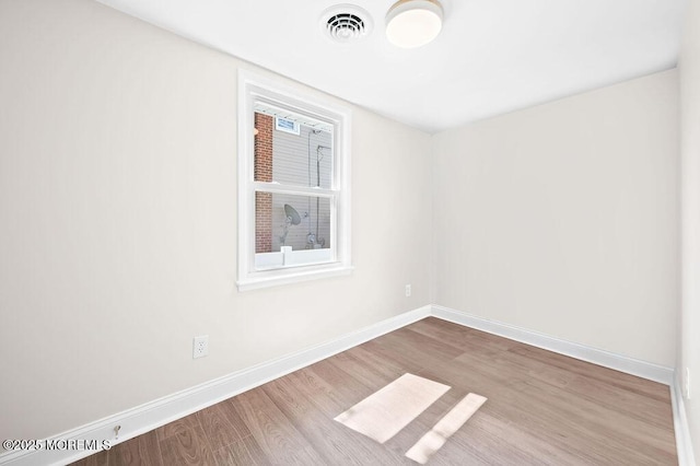 139 Seabreeze Ave, North Middletown, NJ 07748 - empty room with wood finished floors and baseboards