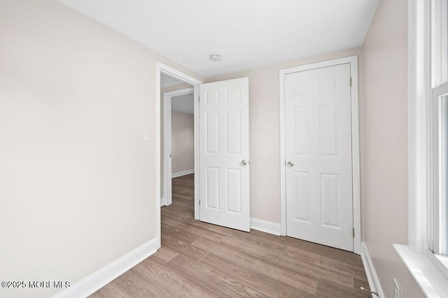 139 Seabreeze Ave, North Middletown, NJ 07748 - unfurnished bedroom with wood finished floors and baseboards
