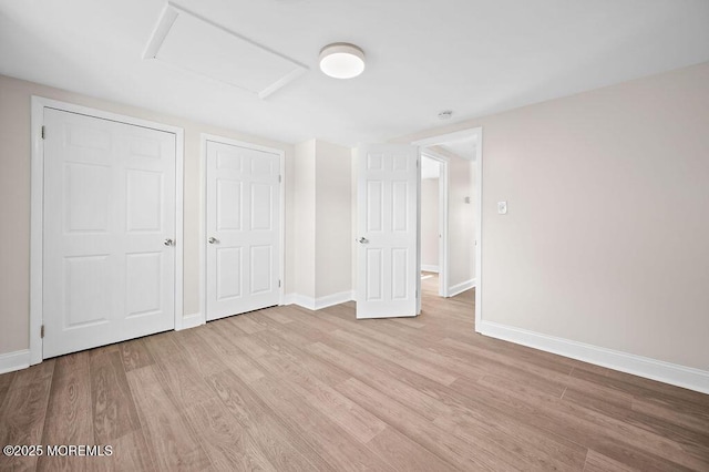 139 Seabreeze Ave, North Middletown, NJ 07748 - unfurnished bedroom with attic access and wood finished floors
