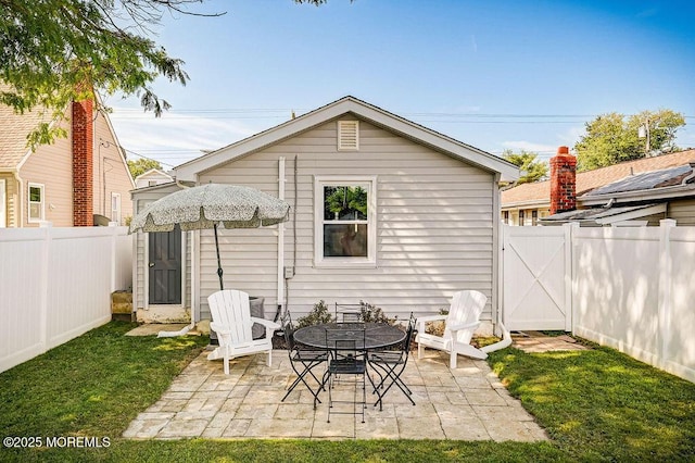 139 Seabreeze Ave, North Middletown, NJ 07748 - rear view of house featuring a fenced backyard, a patio area, and a gate