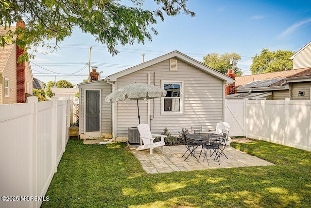 139 Seabreeze Ave, North Middletown, NJ 07748 - rear view of house with a fenced backyard and a patio