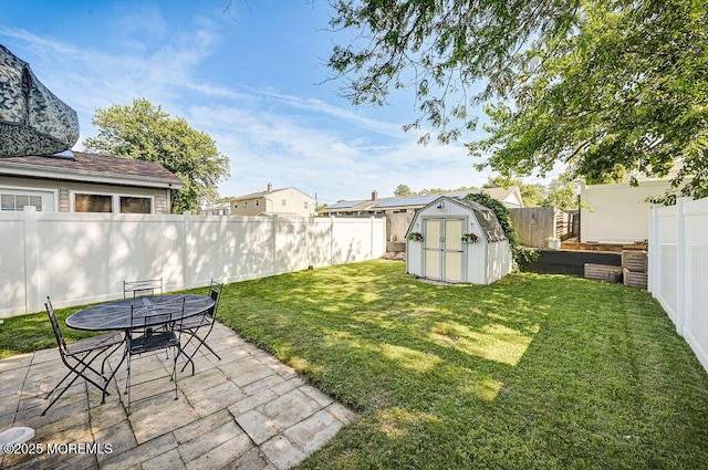 139 Seabreeze Ave, North Middletown, NJ 07748 - fenced backyard with a shed, a patio area, and outdoor dining space