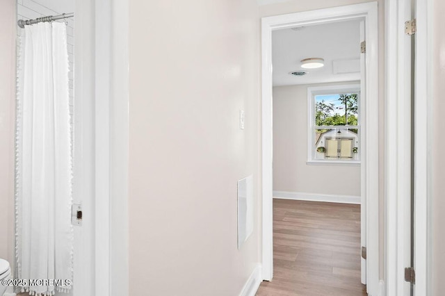 139 Seabreeze Ave, North Middletown, NJ 07748 - hallway with baseboards and wood finished floors