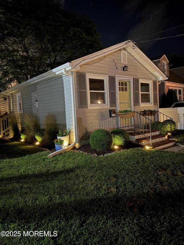 139 Seabreeze Ave, North Middletown, NJ 07748 - view of front facade featuring a front lawn