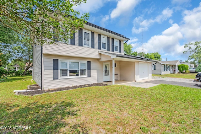 301 6th St, Waretown, NJ 08758 - view of front of house with an attached garage, asphalt driveway, and a front lawn