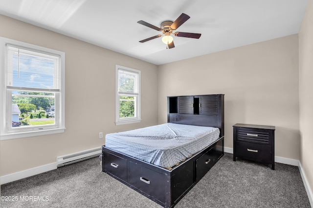 301 6th St, Waretown, NJ 08758 - bedroom featuring a baseboard heating unit, carpet, and a ceiling fan