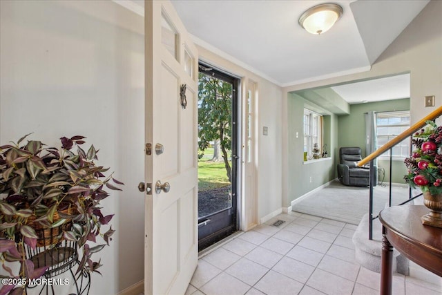 23 Clinton Dr, Manalapan, NJ 07726 - entryway with plenty of natural light, light colored carpet, and light tile patterned flooring