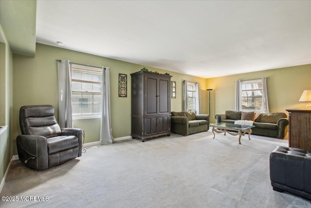 23 Clinton Dr, Manalapan, NJ 07726 - living area featuring light carpet and baseboards