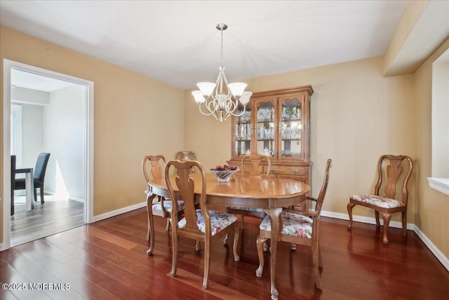 23 Clinton Dr, Manalapan, NJ 07726 - dining room with a chandelier and dark wood finished floors