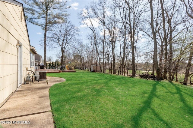 23 Clinton Dr, Manalapan, NJ 07726 - view of green lawn featuring a deck