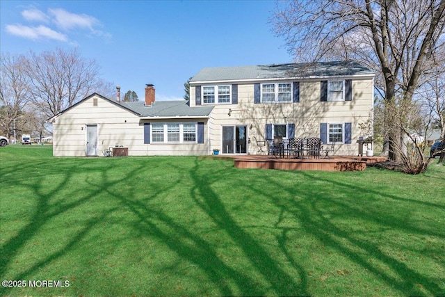 23 Clinton Dr, Manalapan, NJ 07726 - rear view of property with a yard, a chimney, and a deck