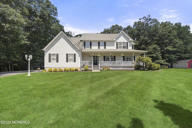 6 Kindling Way, Jackson, NJ 08527 - view of front of property featuring covered porch, a front yard, and a shed