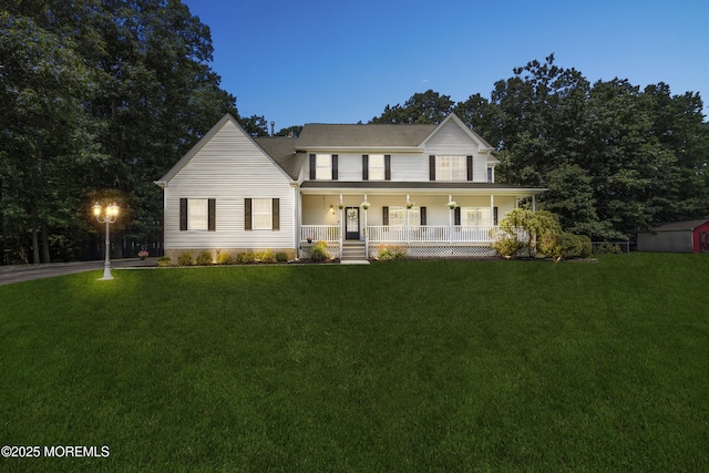 6 Kindling Way, Jackson, NJ 08527 - view of front of home with a porch, a front yard, and a storage shed