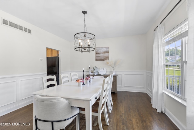 6 Kindling Way, Jackson, NJ 08527 - dining area featuring a chandelier, a decorative wall, a wainscoted wall, and dark wood finished floors