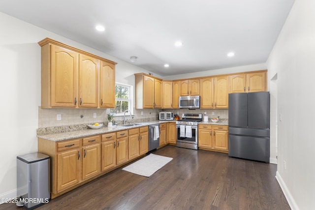 6 Kindling Way, Jackson, NJ 08527 - kitchen featuring appliances with stainless steel finishes, dark wood finished floors, decorative backsplash, light stone counters, and recessed lighting