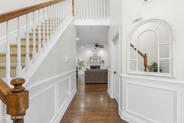 6 Kindling Way, Jackson, NJ 08527 - hall featuring stairway, a decorative wall, a wainscoted wall, and wood finished floors