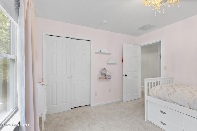 6 Kindling Way, Jackson, NJ 08527 - bedroom featuring light carpet, a chandelier, and a closet