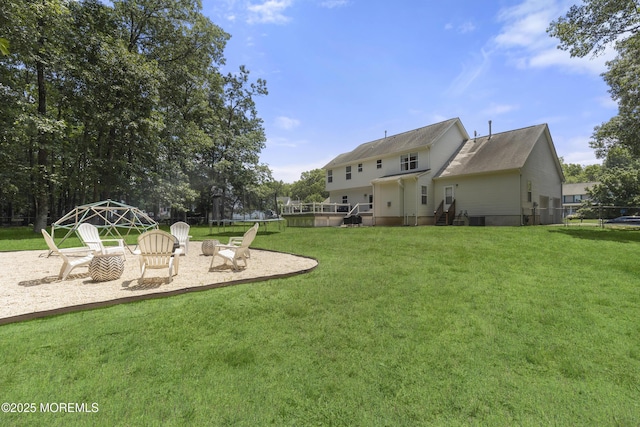 6 Kindling Way, Jackson, NJ 08527 - view of yard featuring a trampoline and a fire pit